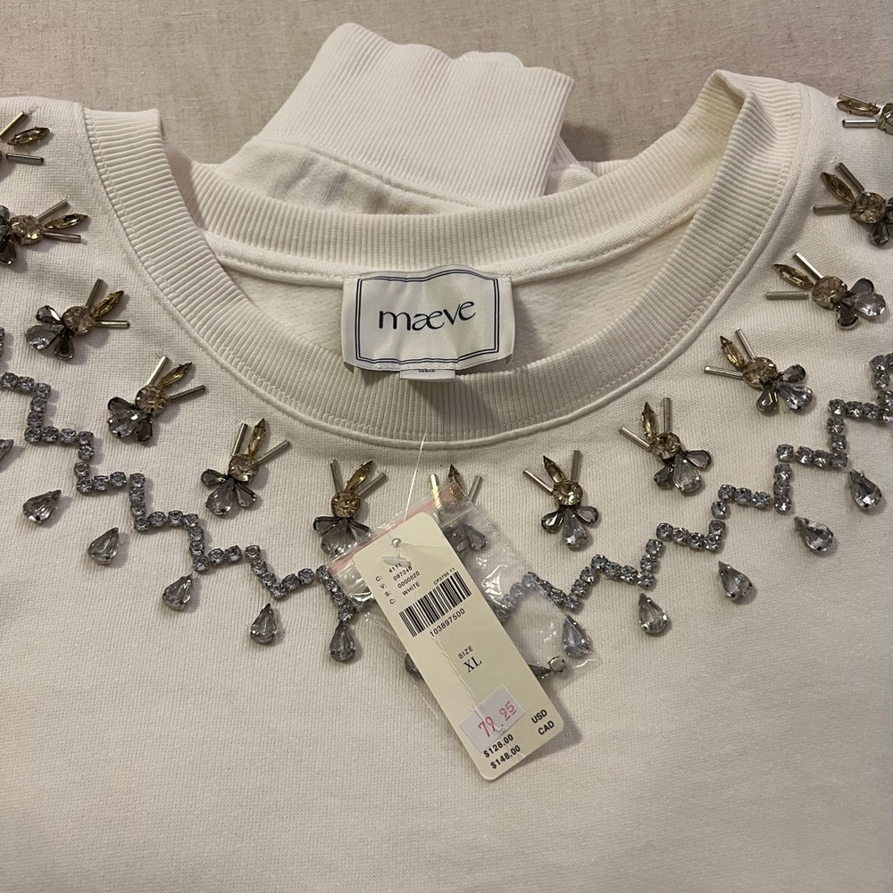 Maeve Ivory Sweater with Gold and Silver Embellishments